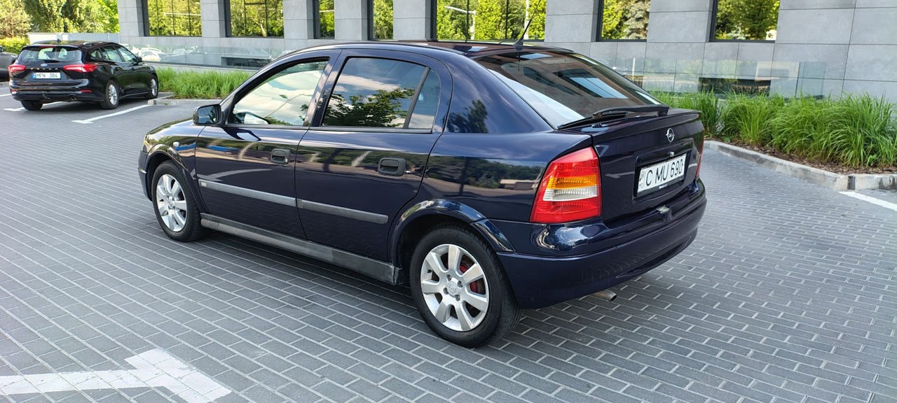 Opel Astra фото 1