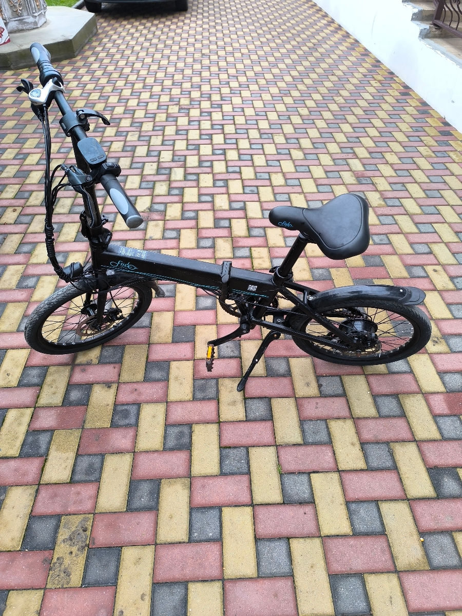 Bicicletă electrică foto 1