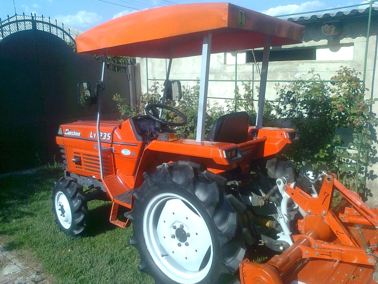 Tractor Kubota L-1, 235 foto 9