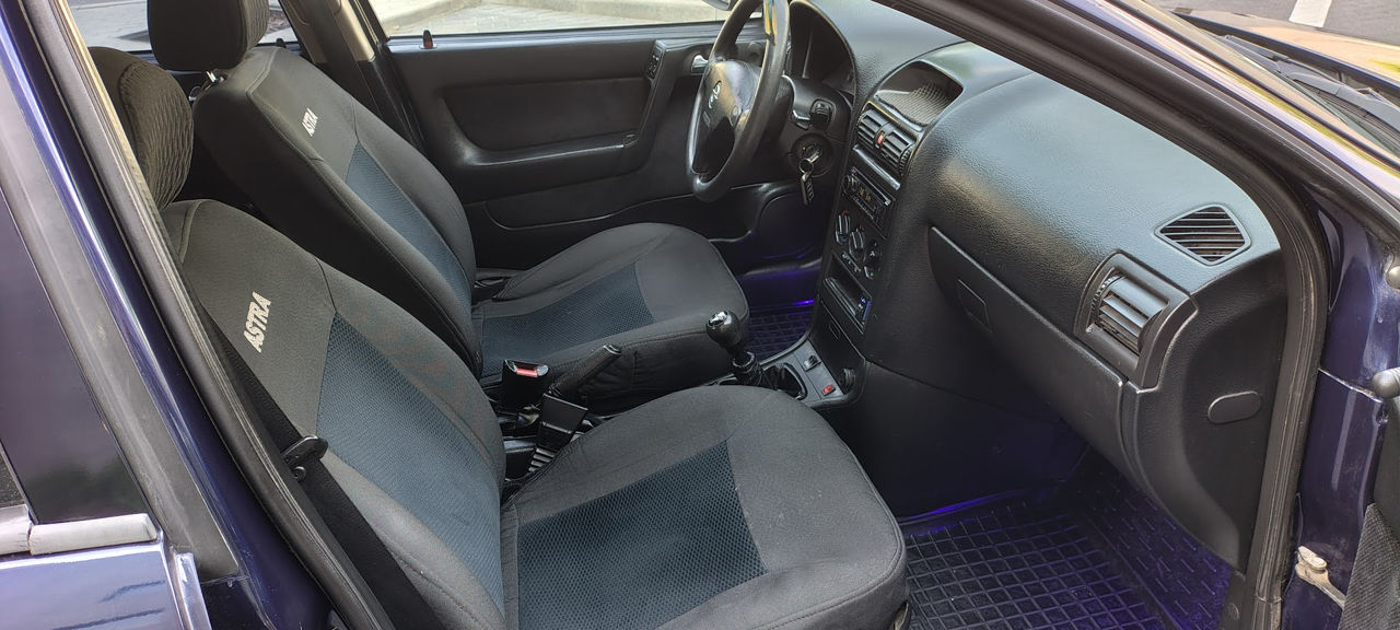 Opel Astra фото 5