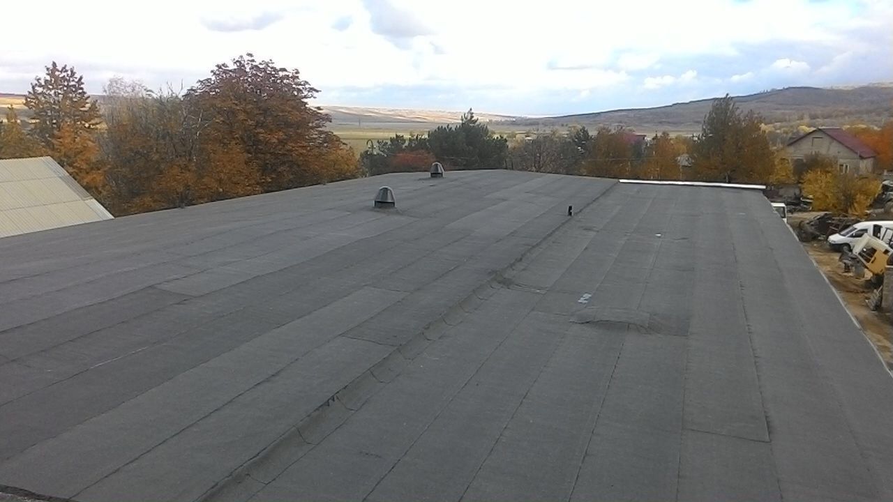 Reparatia acoperisului la blocuri locative, garaje, hale industriale in Moldova foto 3