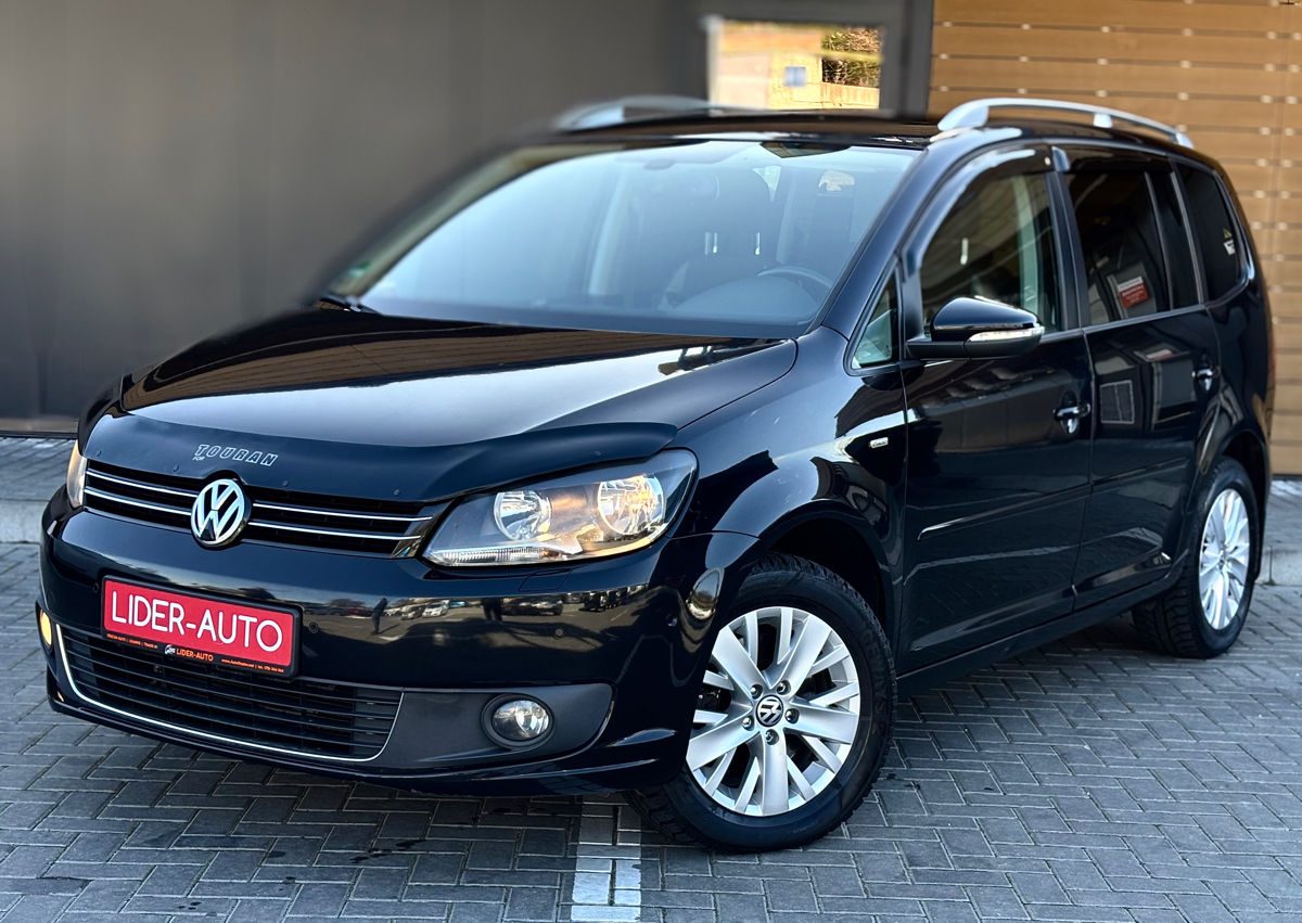 Volkswagen Touran фото 2