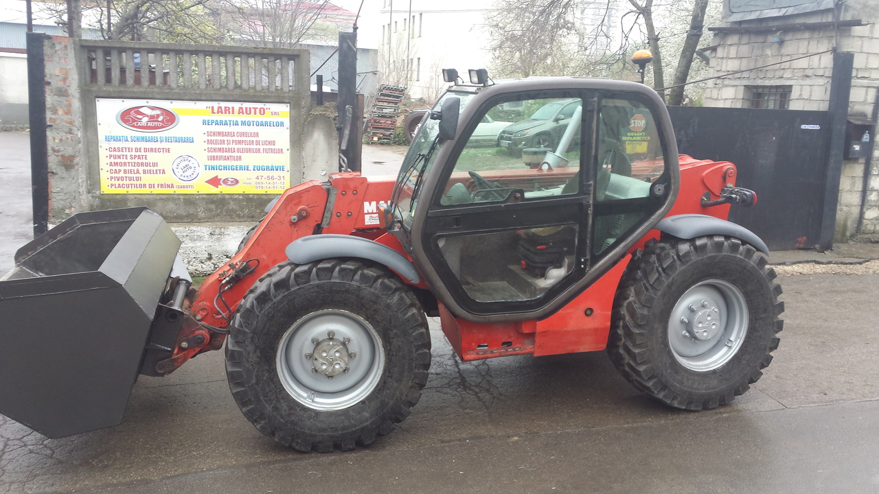 Stivuitor-incarcator telescopic Manitou фото 1