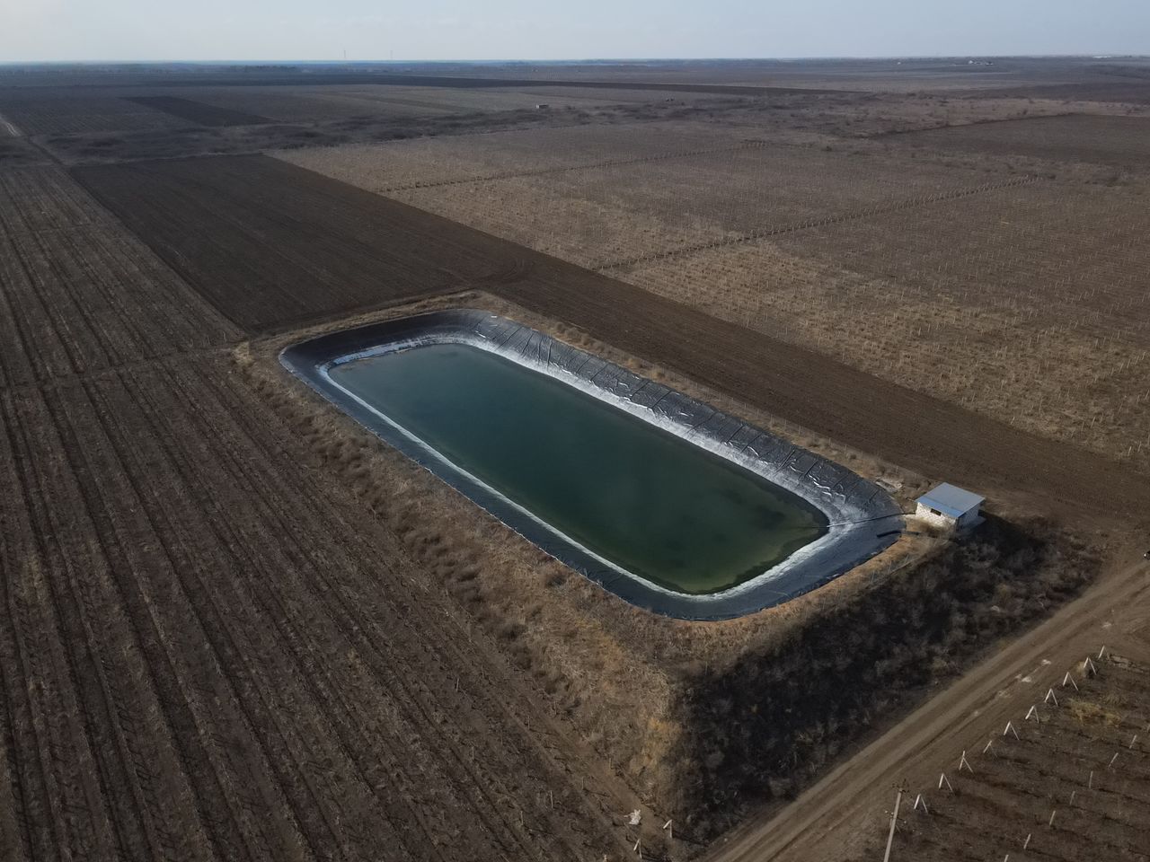 Bazine cu geomembrana pentru acumularea apei- proiectare- constructie la cheie foto 7