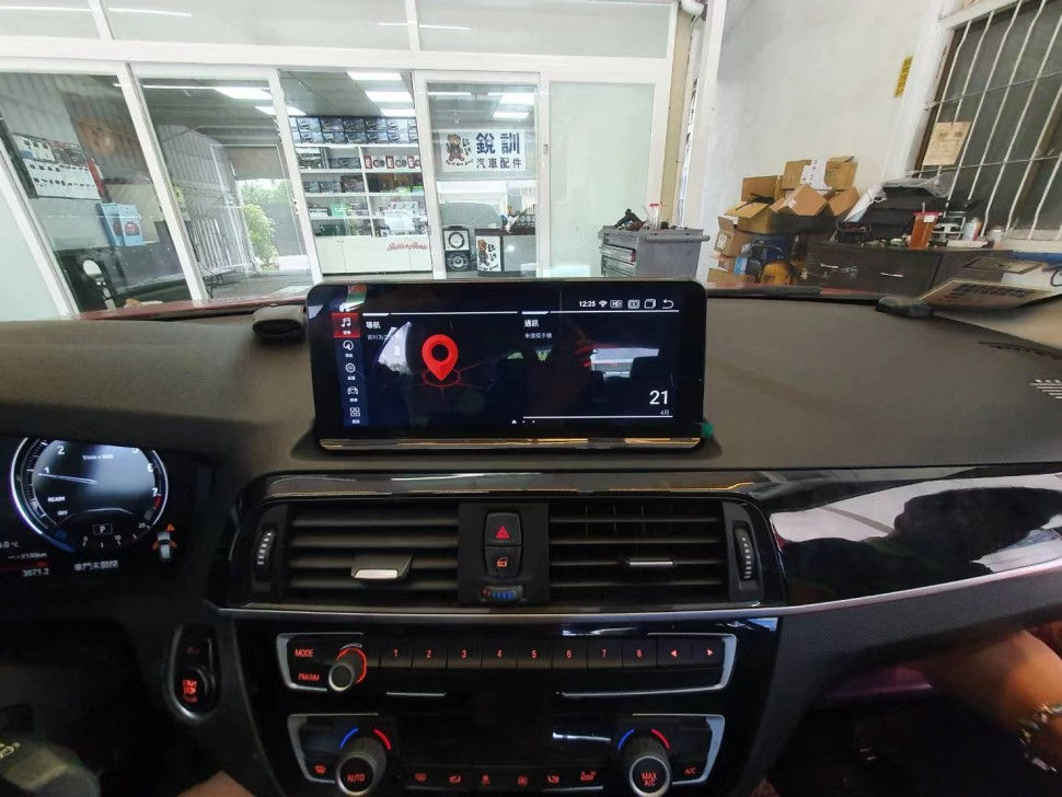 BMW - замена штатных мониторов и приборные панели на Android фото 2