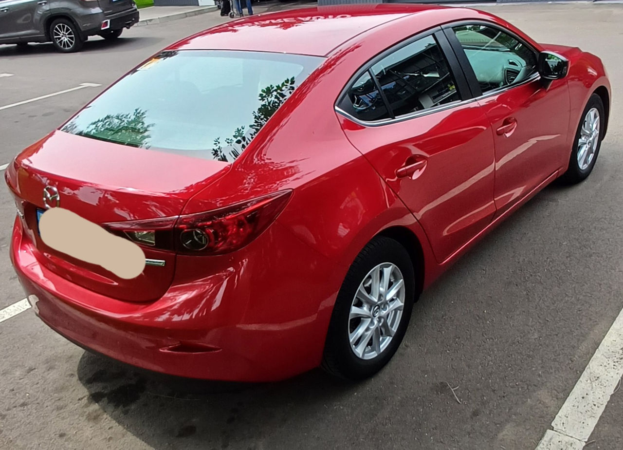 Mazda 3 foto 1