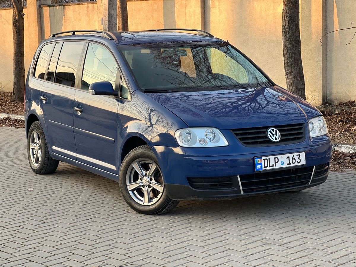 Volkswagen Touran фото 1