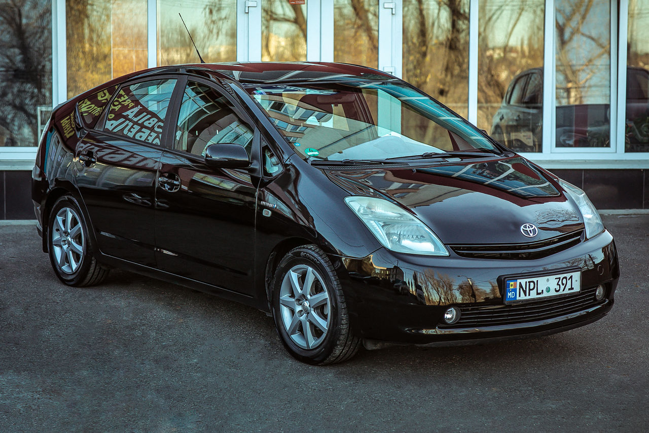 Chirie auto de la10 euro/zi Ford Fusion Toyota Prius Dacia foto 6