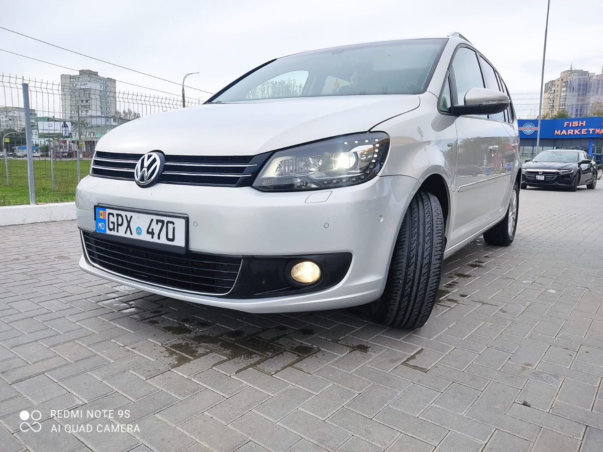 Volkswagen Touran foto 1