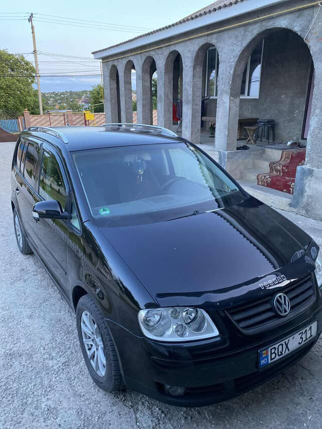 Volkswagen Touran фото 2