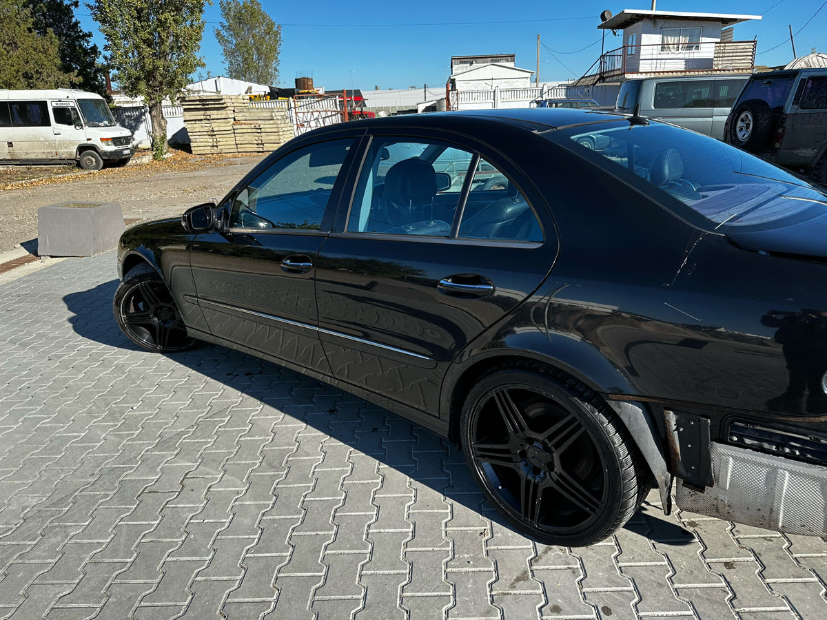 Mercedes W211 foto 7