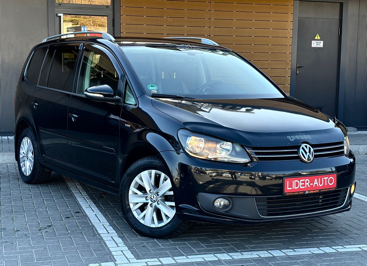 Volkswagen Touran фото 0