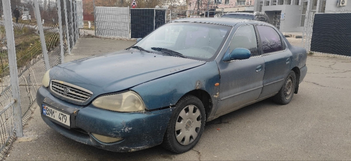 KIA Clarus фото 1