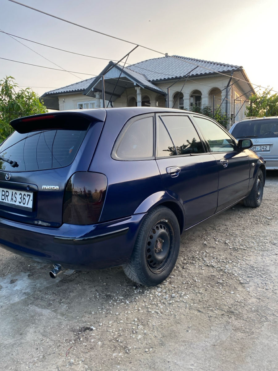 Mazda 323 фото 3