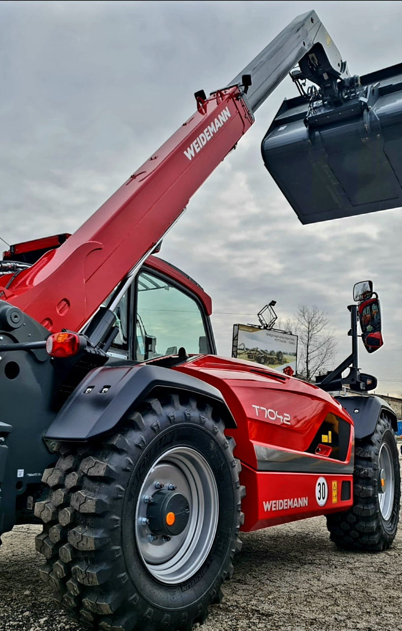 Телескопический погрузчик Weidemann T7042 foto 6