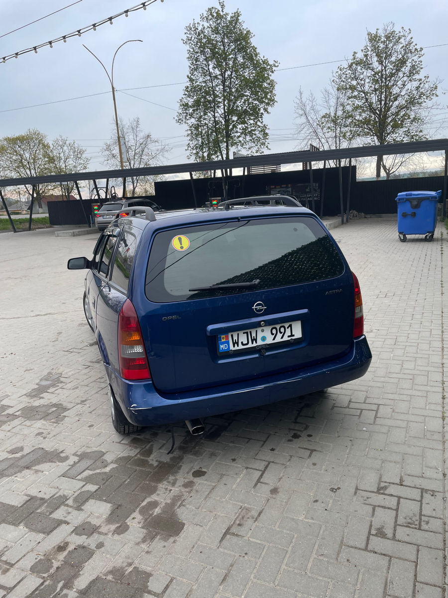 Opel Astra фото 3