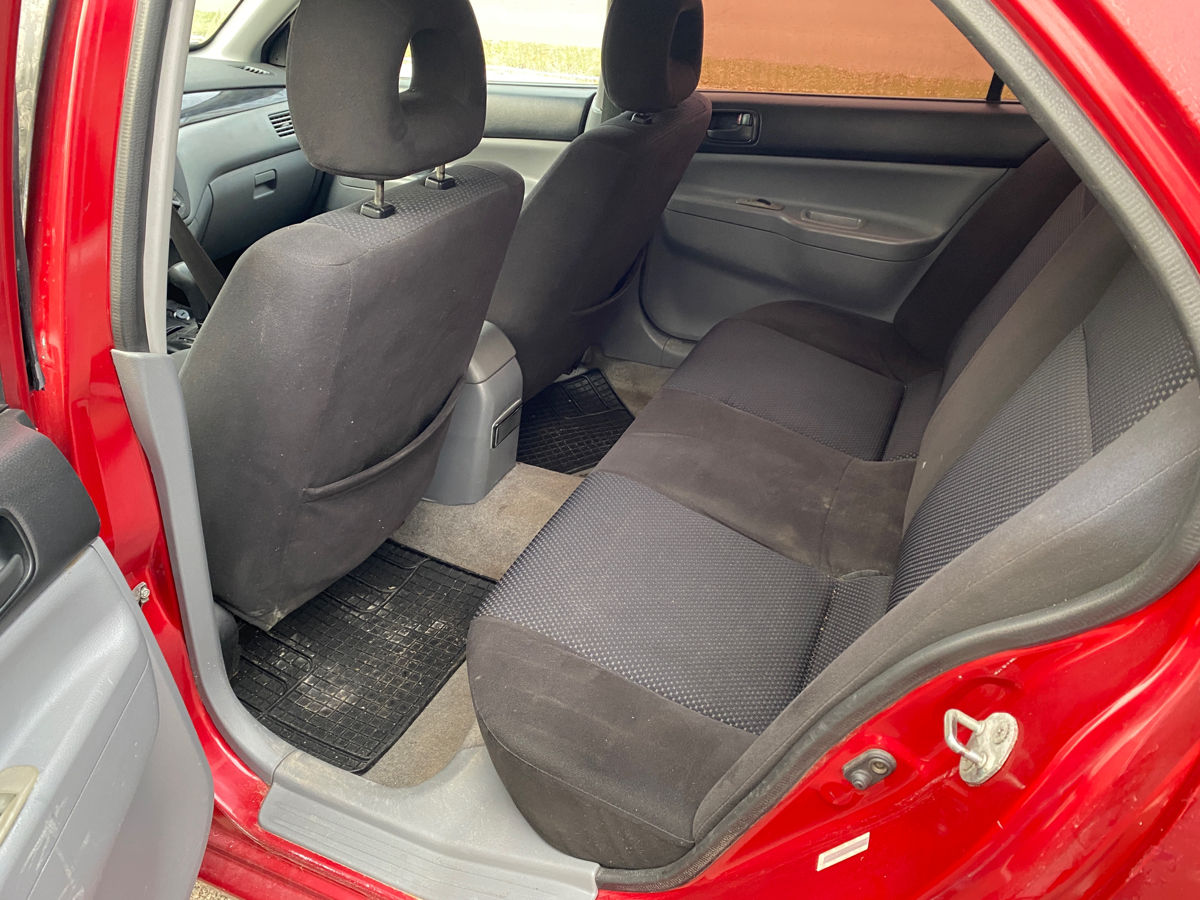 Mitsubishi Lancer фото 8