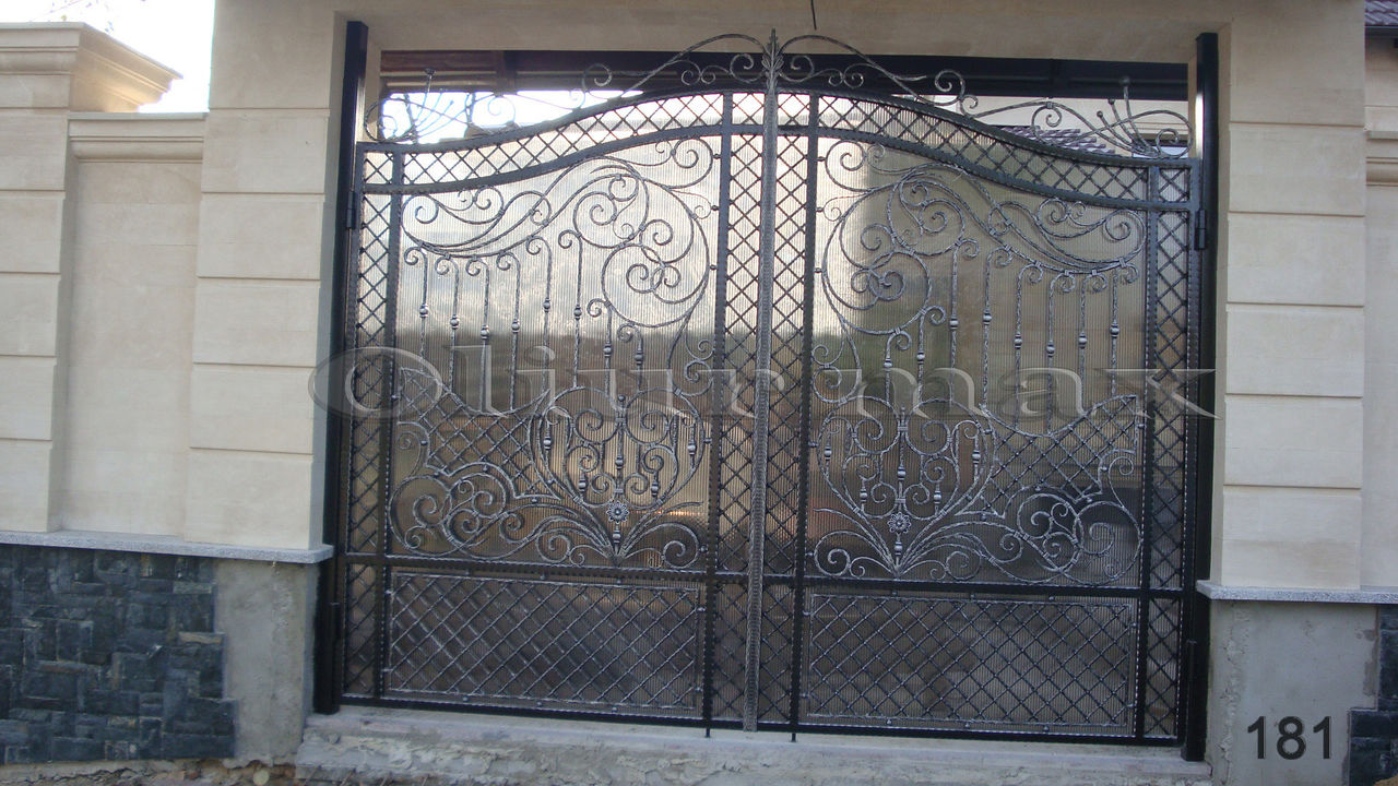 Porți, garduri, balustrade, copertine , gratii, uși metalice și alte confecții din fier forjat. foto 7