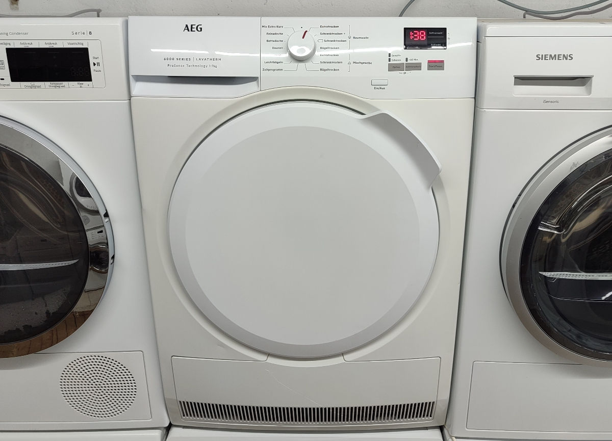 Узкая сушильная машина AEG фото 0