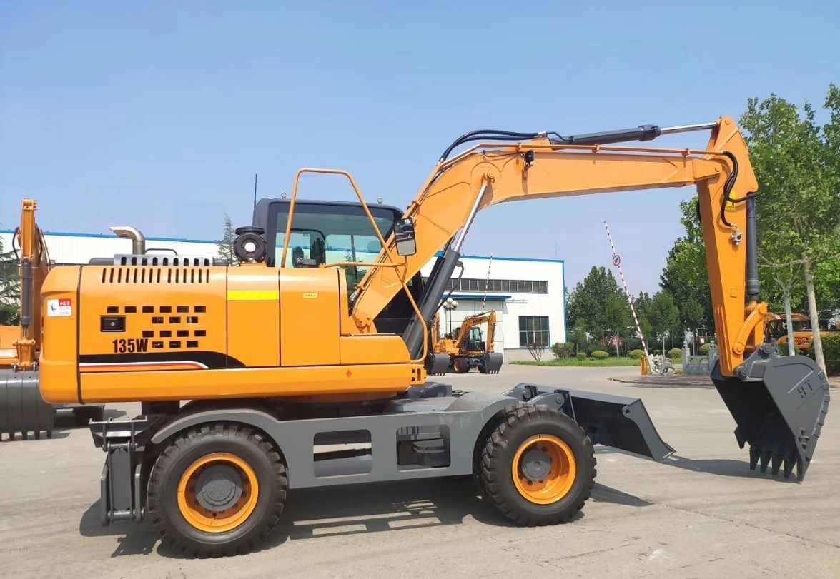 Excavator pe roti -0,6м3 foto 0