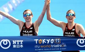 Triathletes Disqualified After Crossing Finish Together Hand-in-Hand