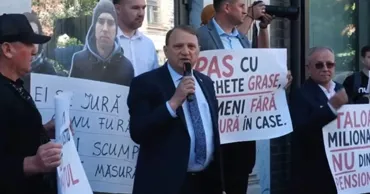 Бумаков на протесте у НАРЭ: Чем дороже газ, тем выше прибыль