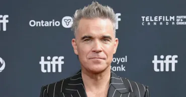 Robbie Williams riscă să rămână orb din cauza injecțiilor pentru slăbit