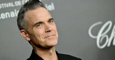 Cântărețul Robbie Williams, dat în judecată de coautorul hitului său Angels