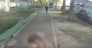В Украине опубликовали видео побега полицейских от уличного стрелка
