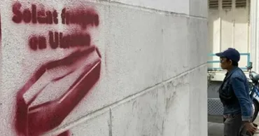 Șapte moldoveni, amendați la Paris pentru graffiti cu mesaje despre Ucraina