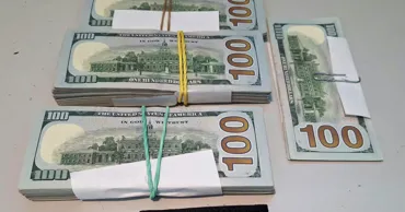 24.500 de dolari nedeclarați, depistați în bagajul unei pasagere la Aeroport