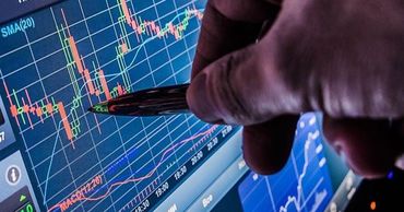 Bloomberg: ущерб мировой экономике из-за коронавируса составит $5 трлн.