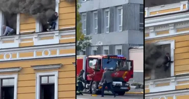 Atac în centrul Kievului: Oameni ies pe ferestre ca să scape de flăcări