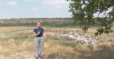 В одном из сел Новоаненского района мусор оказался рядом с природным памятником