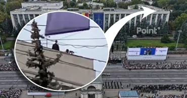 На крыше здания правительства во время парада заметили снайпера и вооруженных людей