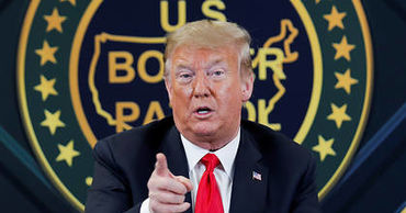 Twitter пометил сообщение Трампа как "угрозу насилием".