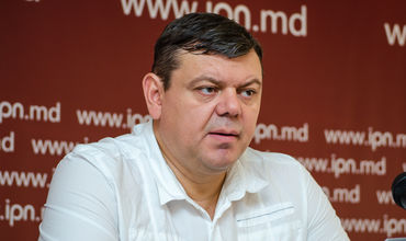 Политический комментатор Роман Михэеш.