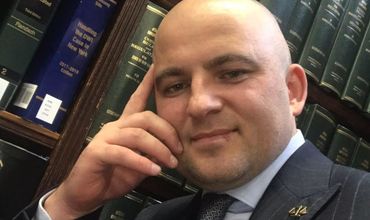 Независимый кандидат от избирательного округа США-Канада Виорел Савва.