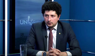 Депутат PAS Раду Мариан.