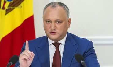 Додон намерен до промульгации глубоко изучить законы о налоговой реформе. Фото: Europa Libera.