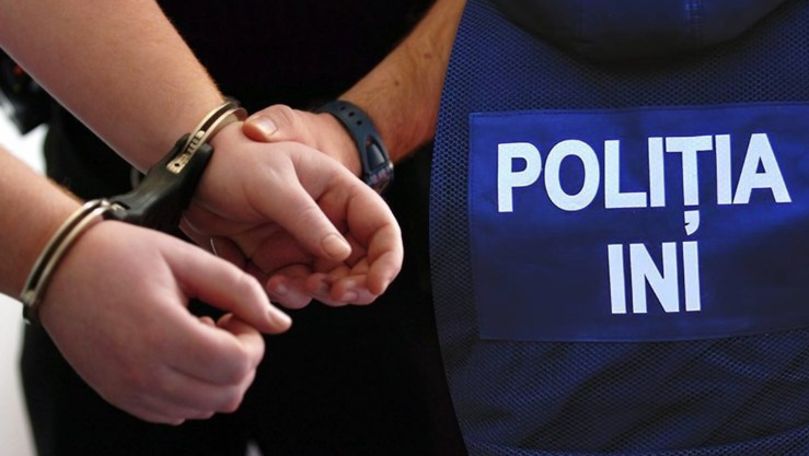 Doi ofițeri de la Inspectoratul Național de Investigații, încătușați