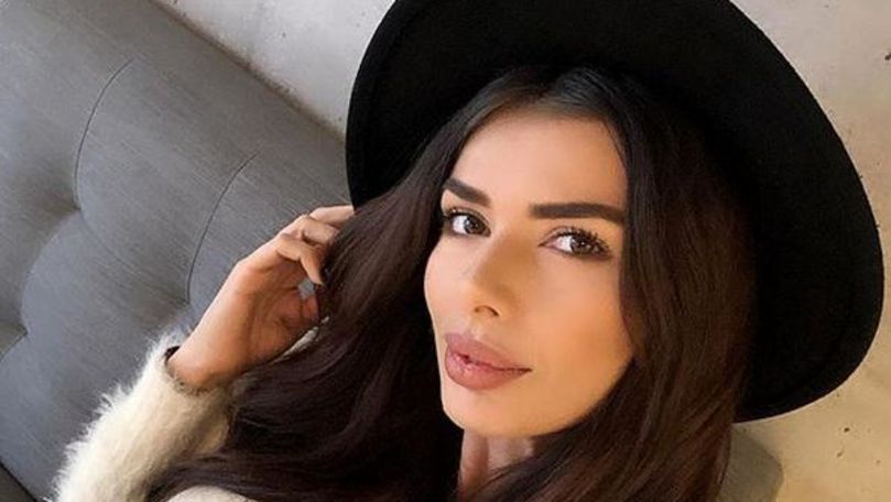 Miss România, surprinsă în ipostaze incendiare cu un cântăreţ însurat