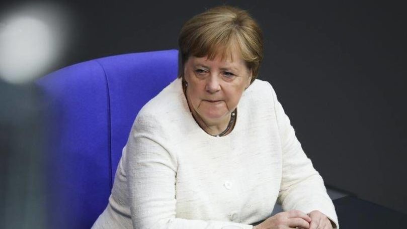 Merkel, văzută tremurând pentru a doua oară la o întâlnire oficială