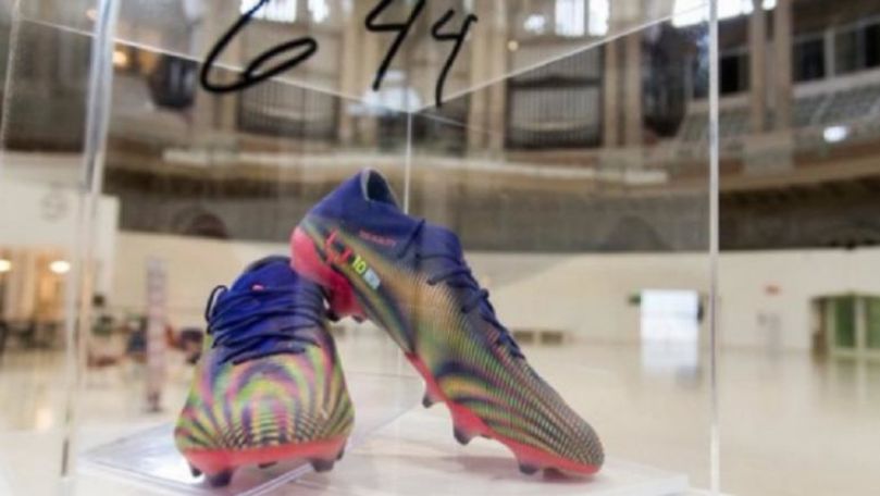O pereche de ghete ale lui Messi, vândute la licitaţie cu 143.000 euro