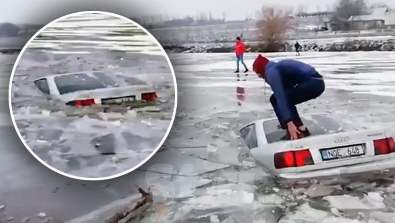 Șofer cu Audi, filmat cum cade sub gheață cu tot cu mașină de Bobotează