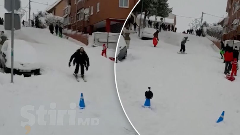 O familie de moldoveni a filmat cum oamenii se bucură de omăt în Spania
