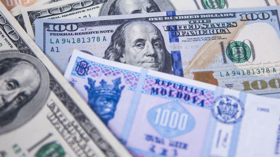În mai, leul moldovenesc s-a depreciat cu 2,7% în raport cu dolarul SUA