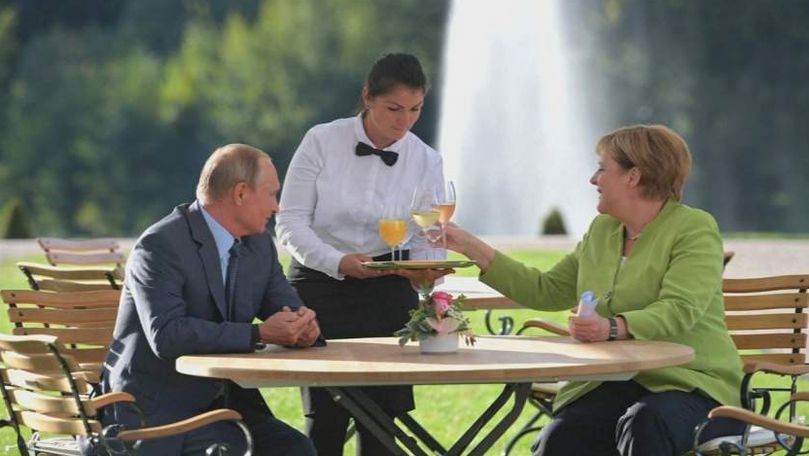 Imagini inedite cu Putin și Merkel, la întâlnirea de la Berlin