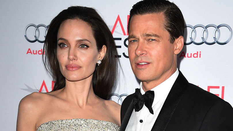 Angelina Jolie şi Brad Pitt au fost declaraţi oficial din nou singuri