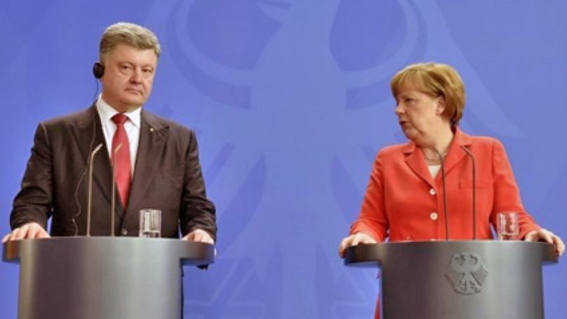 Moment jenant: Merkel a refuzat să dea mâna cu preşedintele Ucrainei